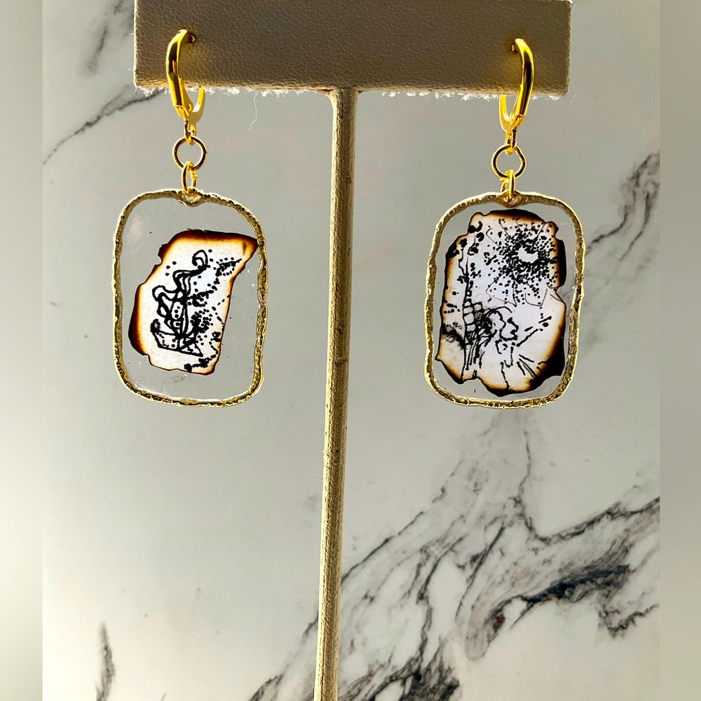 Handmade resin earrings with drawings inside